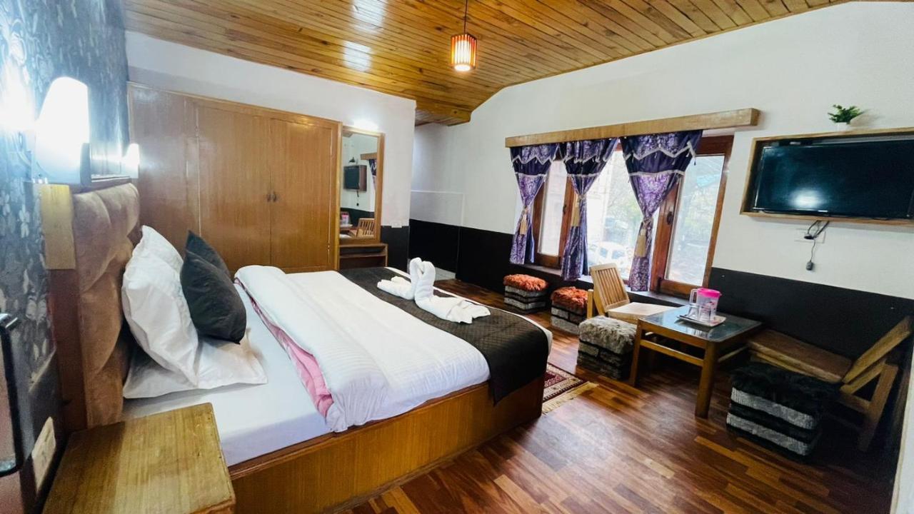 Hotel New Hilltop Inn Манали Экстерьер фото