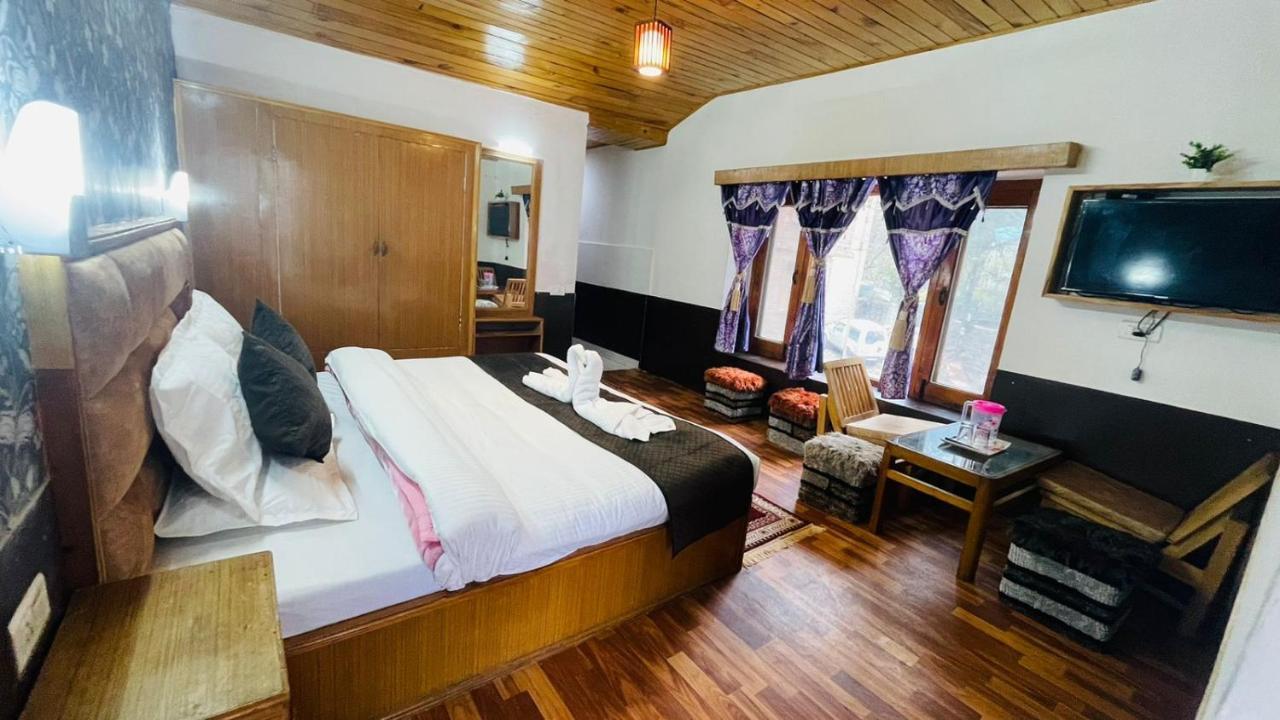 Hotel New Hilltop Inn Манали Экстерьер фото